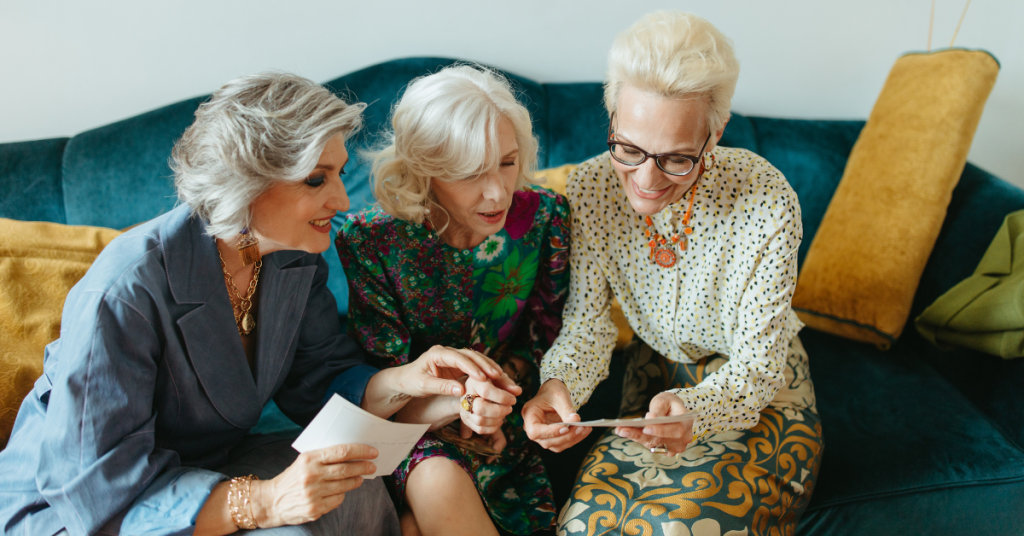 old ladies looking at photos