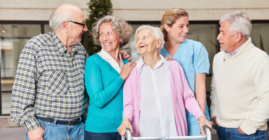a group of seniors with caregiver