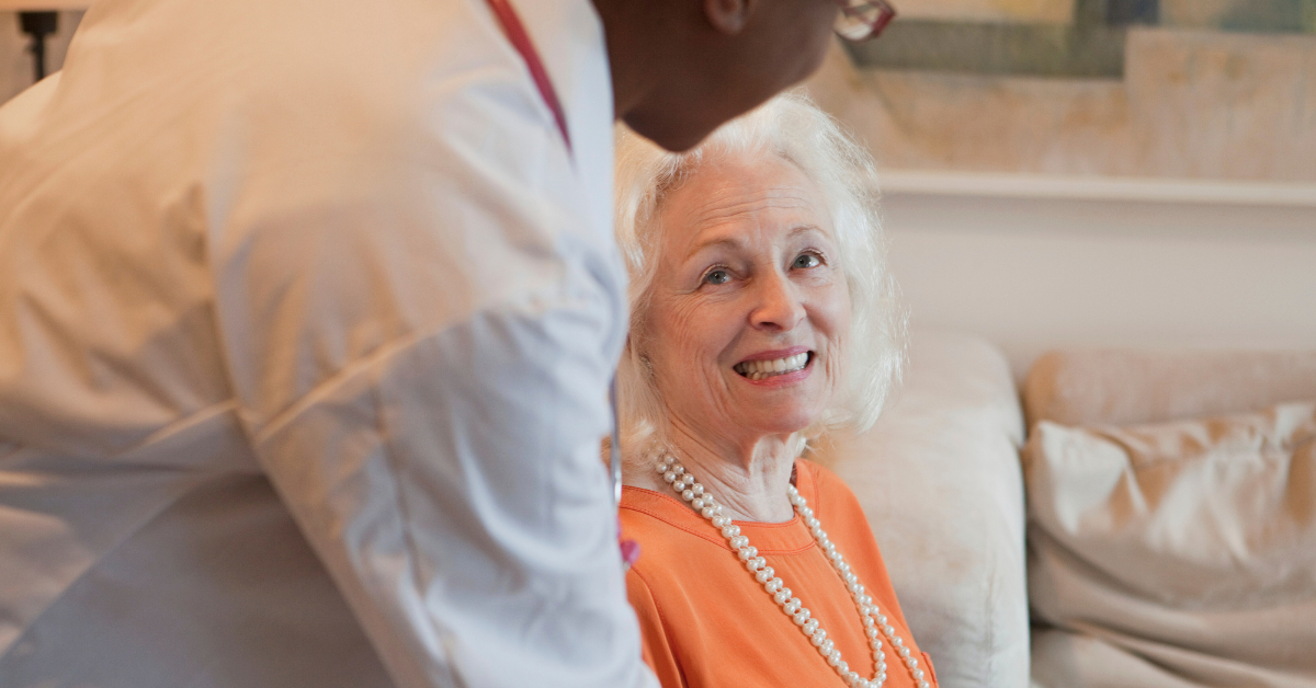 an old lady with a caregiver