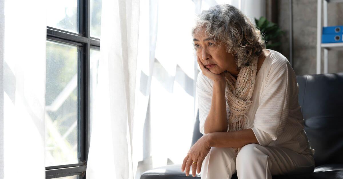 senior thinking in an assisted living