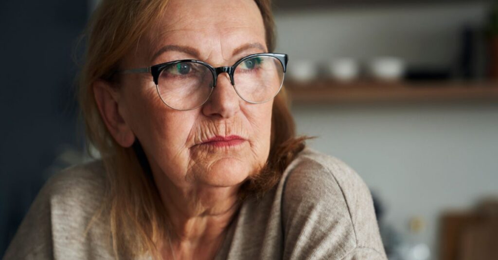 senior thinking in an assisted living